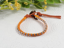 Load image into Gallery viewer, Bloom - Freesias - Green Bloom - Orange leather wrap bracelet with orange accents
