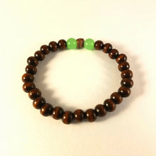 Load image into Gallery viewer, Dark Brown Wood Bracelet with Green Bead Accent
