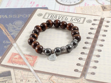 Load image into Gallery viewer, Dark Brown Wood and Hematite Bracelet with silver accents
