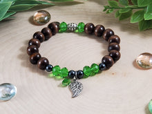 Load image into Gallery viewer, Dark Brown Wood Bracelet with Green Bead accent and Leaf
